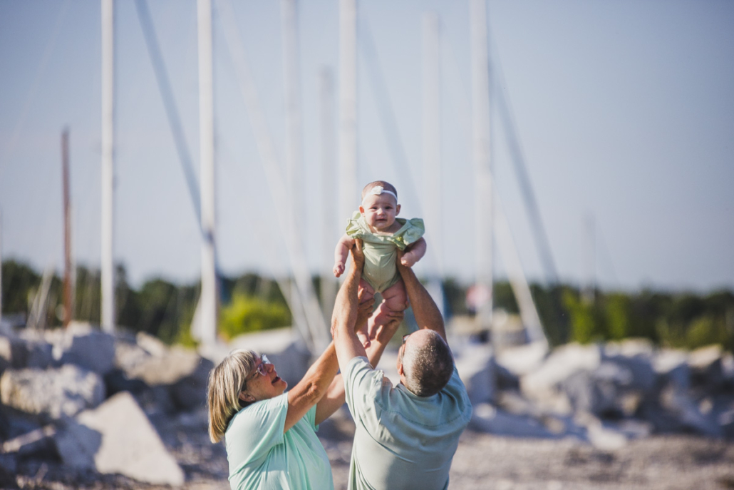 lion king baby with sailboats in background