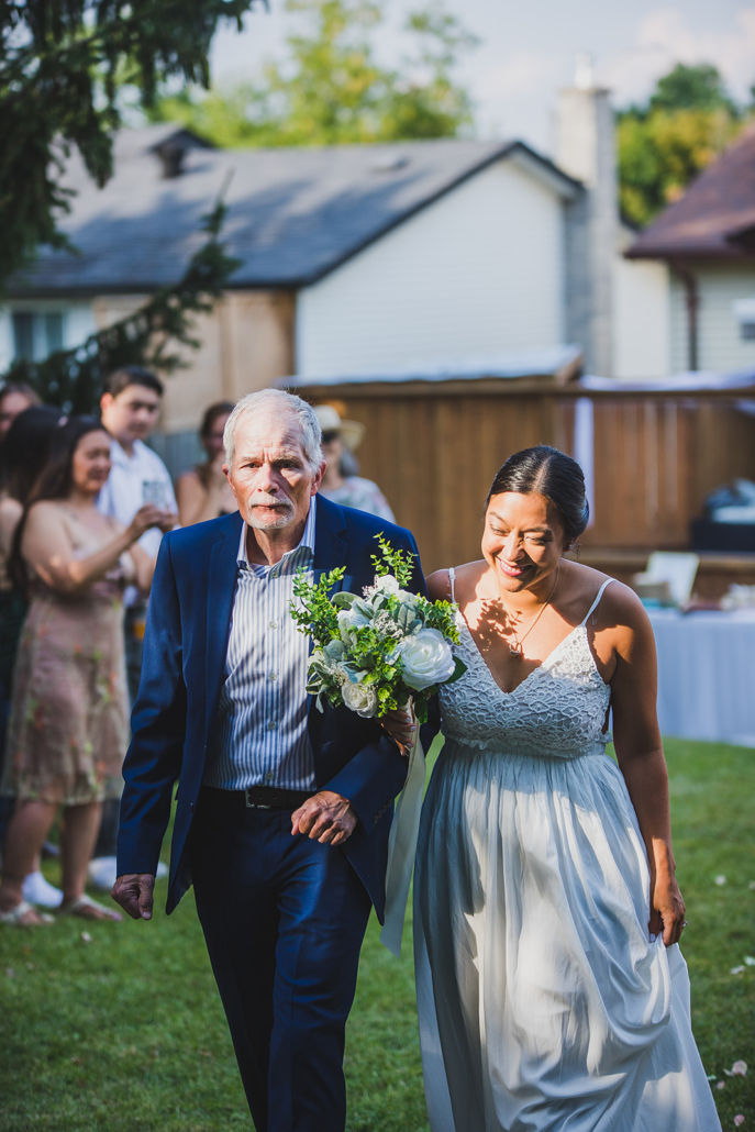 bride walking down the aisle in Barrie wedding