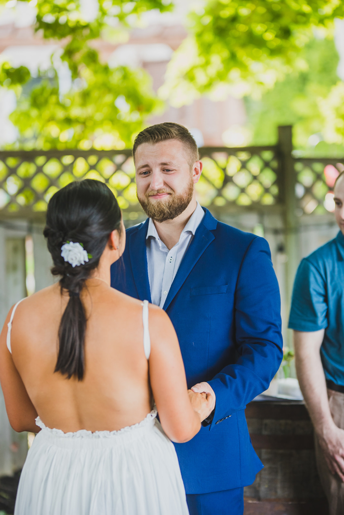 groom looking at bride in Barrie wedding ceremony