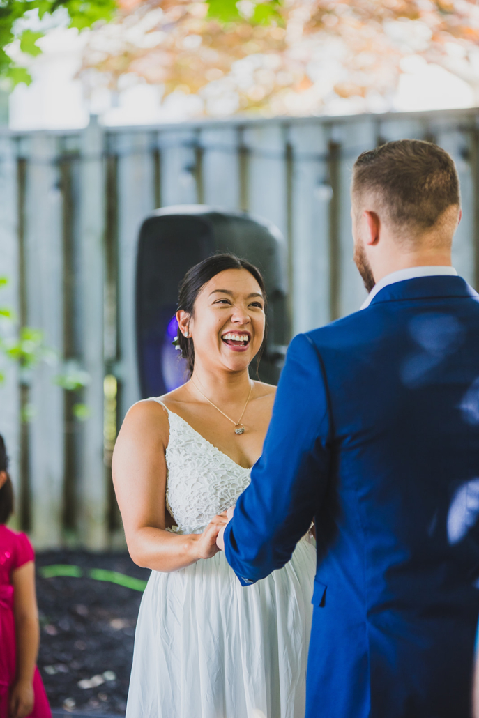 bride looking at groom in Barrie wedding ceremony