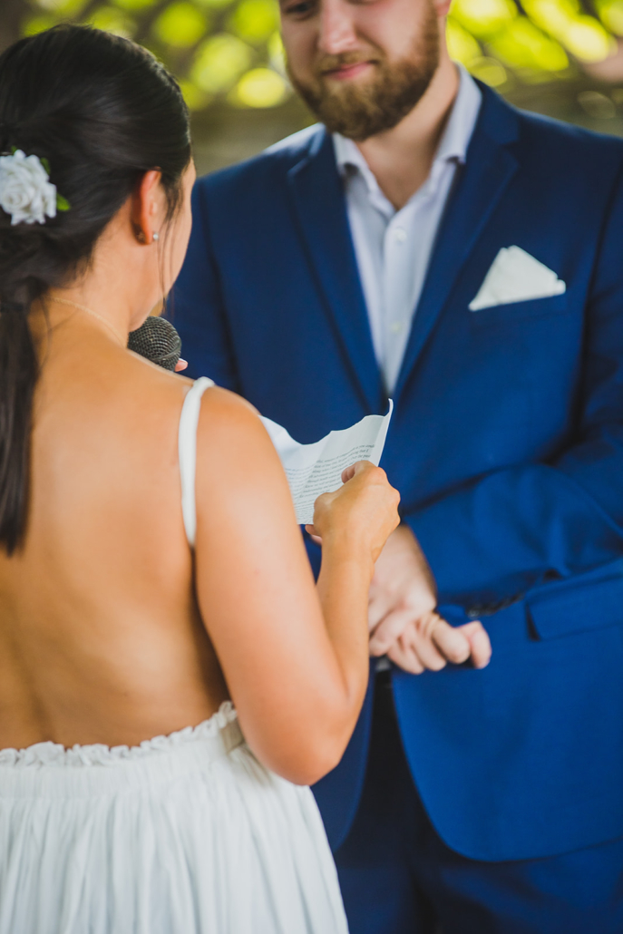 bride reading vows to groom