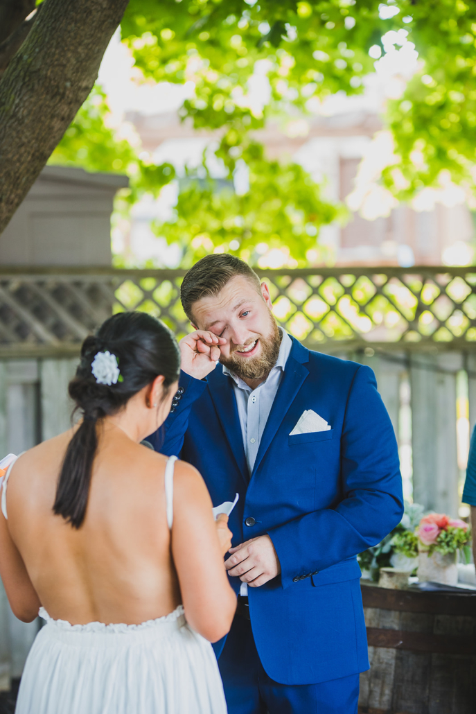 groom crying at bride's vows