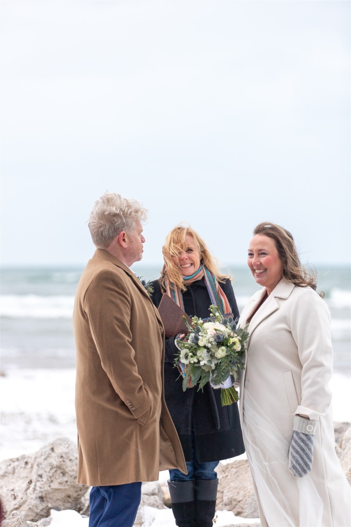 bride and groom laughing